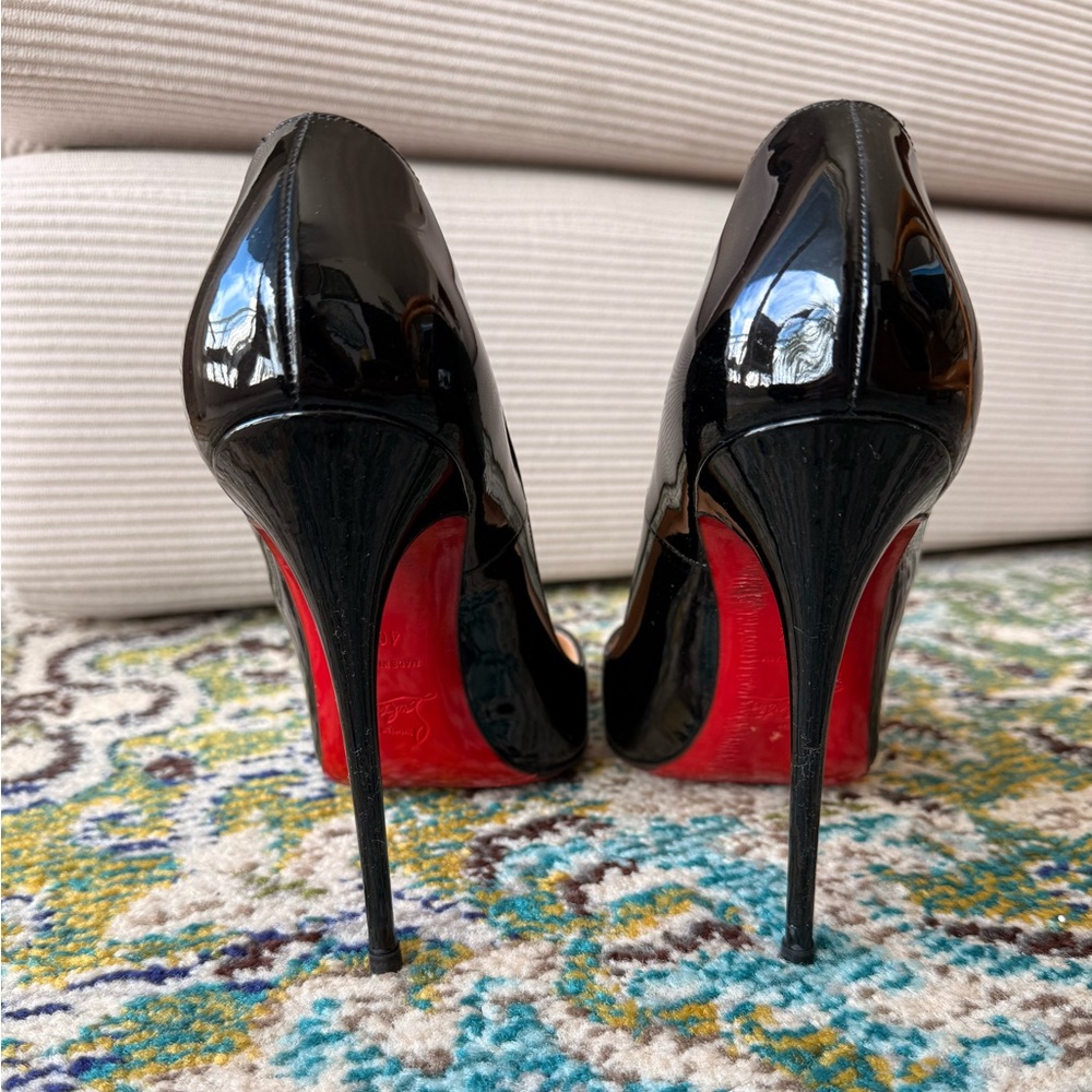 Christian Louboutin Black Patent Pumps with Red Soles